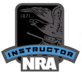 NRA Instructor emblem with a bird and year 1871.